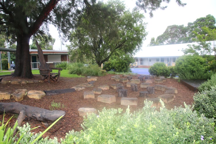 Picture of the yarning circle with timber and sandstone features